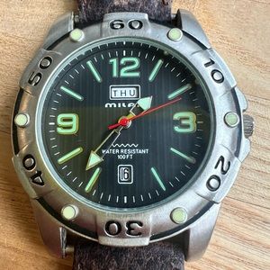 Milan black dial silver tone canvas water resistant watch NEW BATTERY